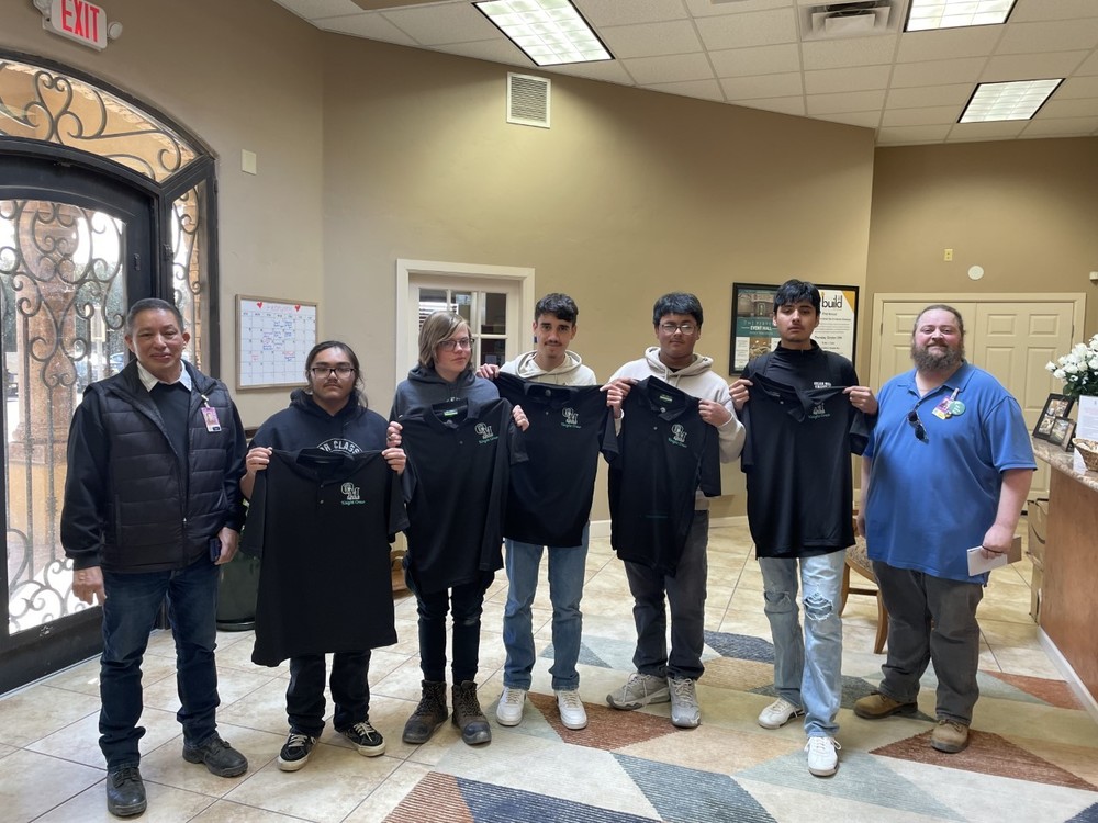 Building Trade Students getting their new shirts