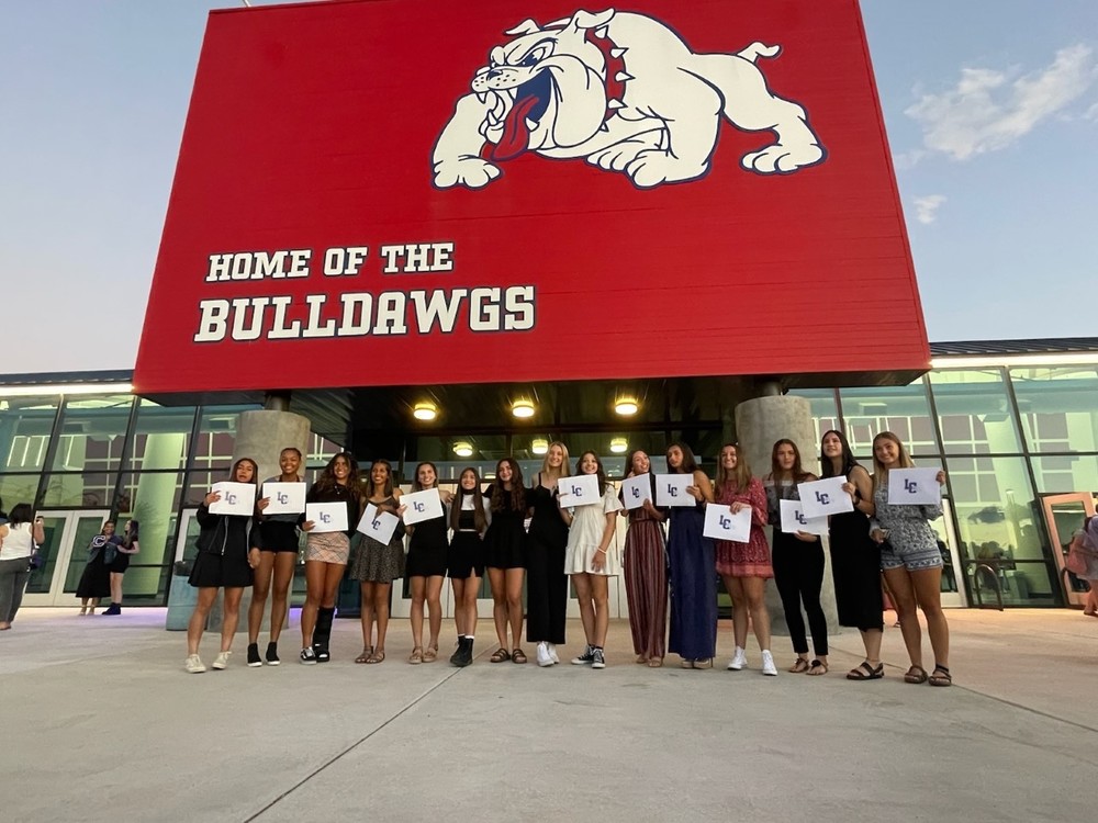 The Las Cruces High School Lady Bulldawgs' Soccer Team pose  together  as they celebrate with their  academic awards for having a 3.5 or higher GPA