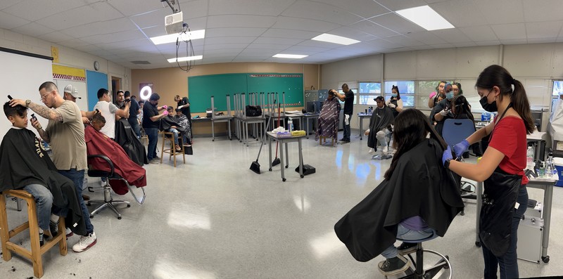 Students get a new haircut during Back-to-School Summer Camp